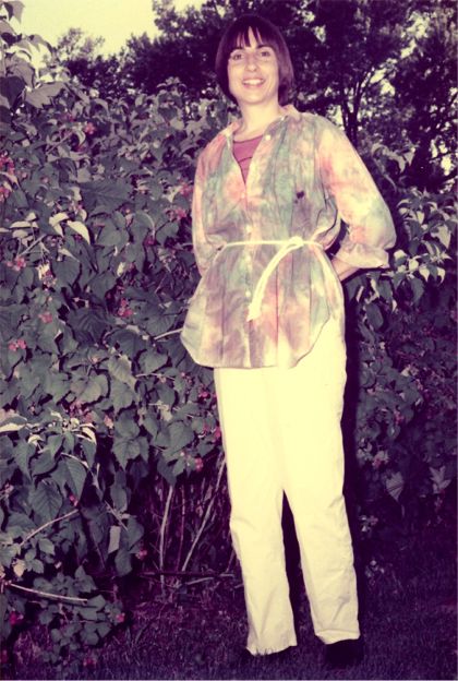 Margaret Ardussi, July 1, 1984, wearing a shirt she painted after she spilled ink on it. Margaret was a genius artist in water-based paints.