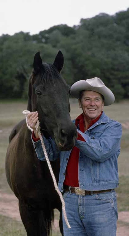 Ronald Reagan with his horse, Little Man, at his Texas ranch in February 1977.