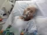 Maggie Byrd with an oxygen mask in a hospital bed in her final hours.