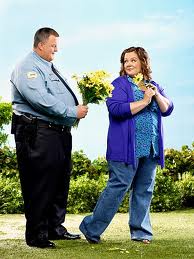 Promotional photo of the title characters of the romantic comedy on CBS, "Mike and Molly," played by Billy Gardell and Melissa McCarthy.