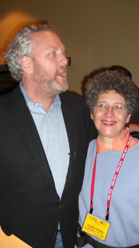 Cynthia Yockey stands by Andrew Breitbart at CPAC 2012 in the Bloggers Lounge.